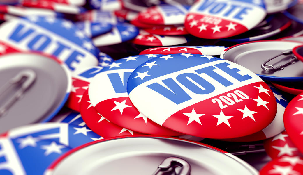 buttons and pins that say vote