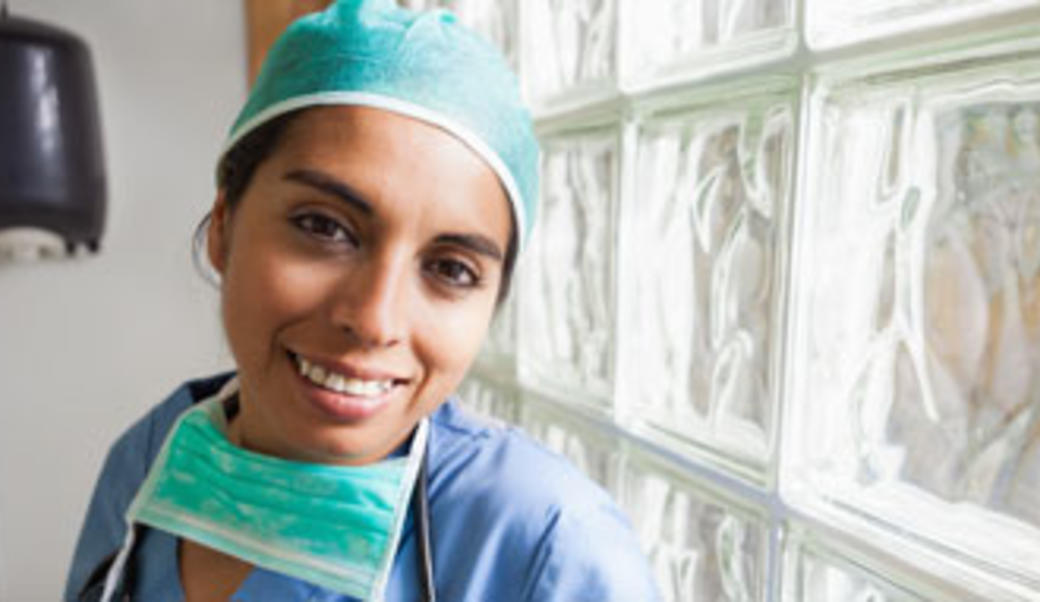 Hispanic doctor in scrubs