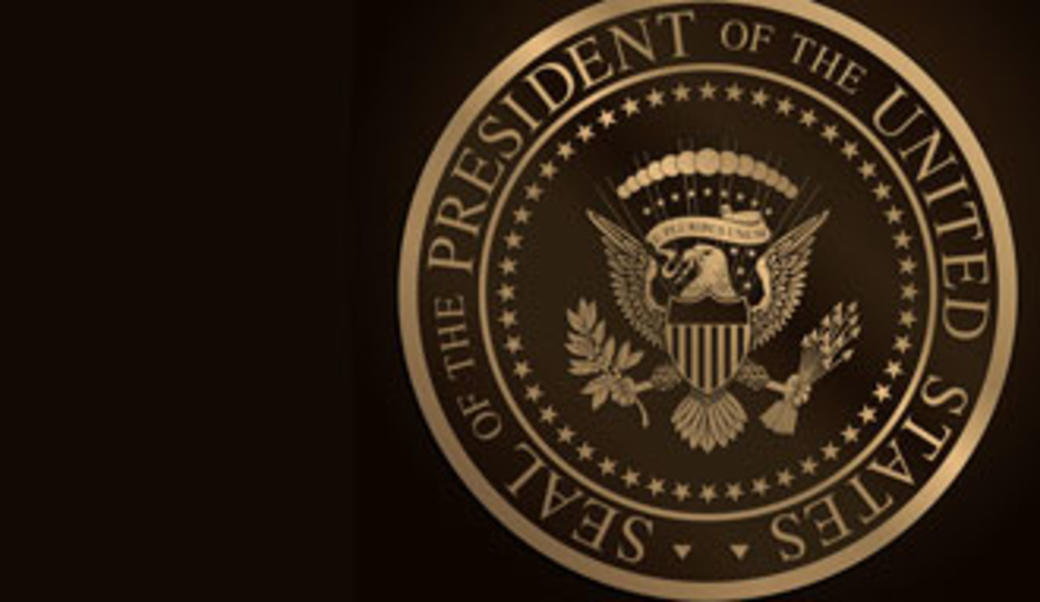 Presidential seal in gold on black background