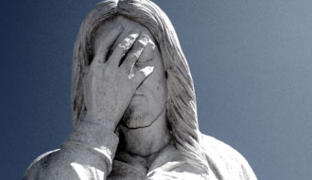 statue of Jesus weeping