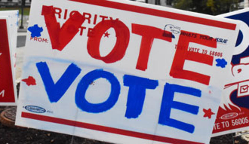 Signs encouraging people to vote