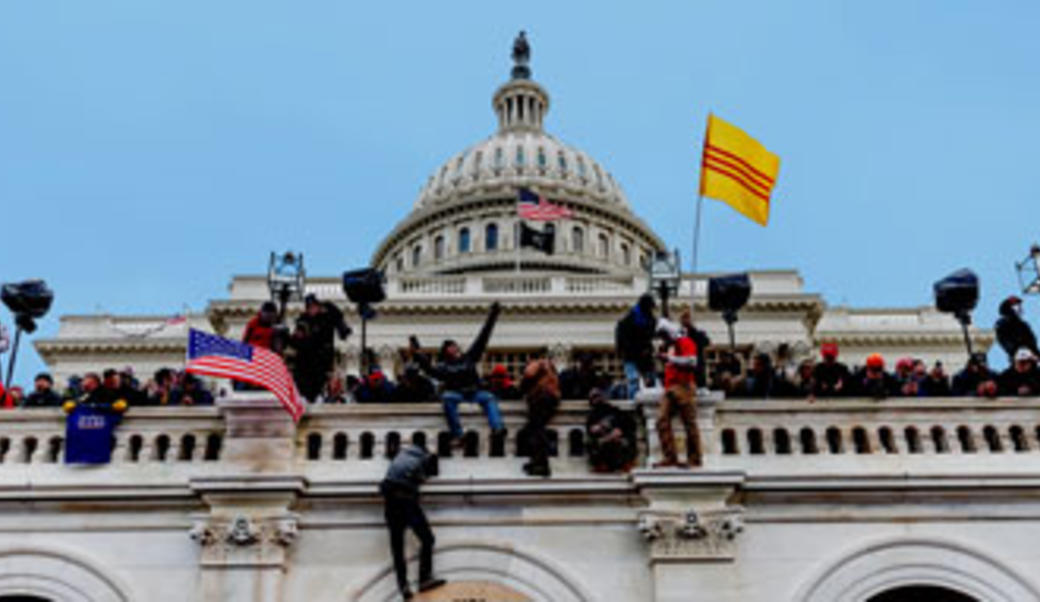 Crowd climbing on U.S. Capitol building