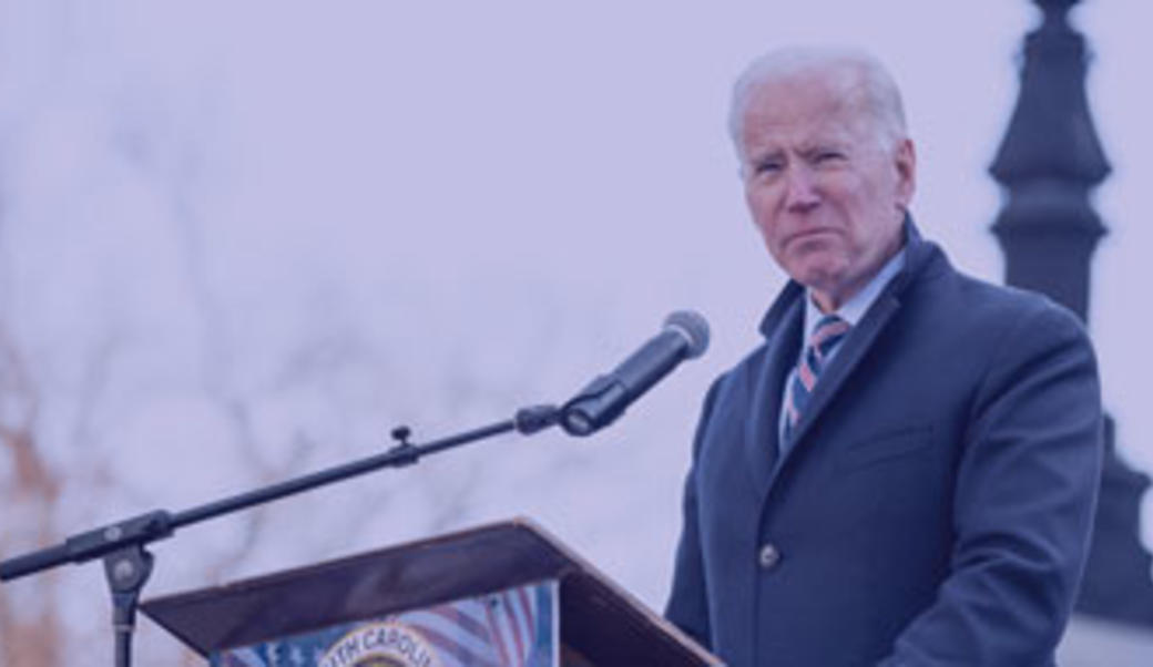 President Biden speaking at a podium