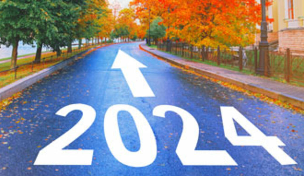 2024 painted on road with arrow pointing ahead