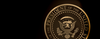 Presidential seal in gold on black background