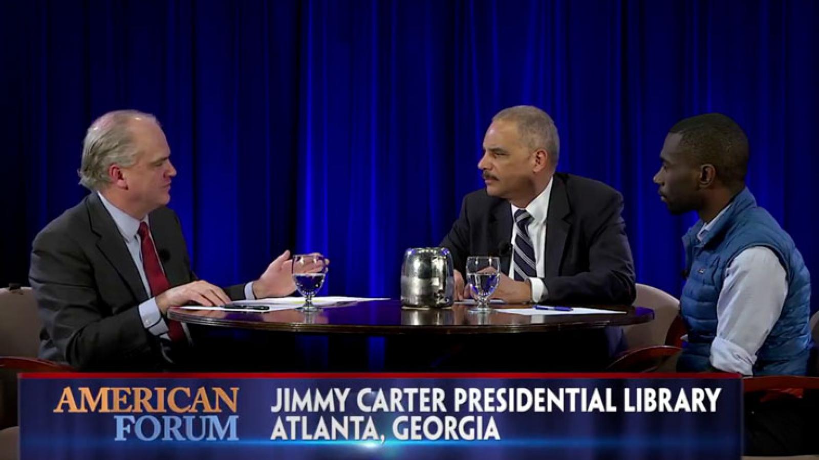 Eric Holder and DeRay Mckesson talk with Doug Blackmon