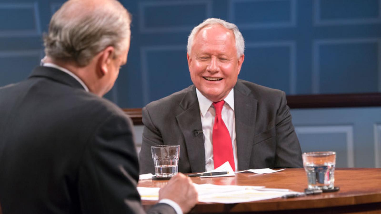 William Kristol laughs